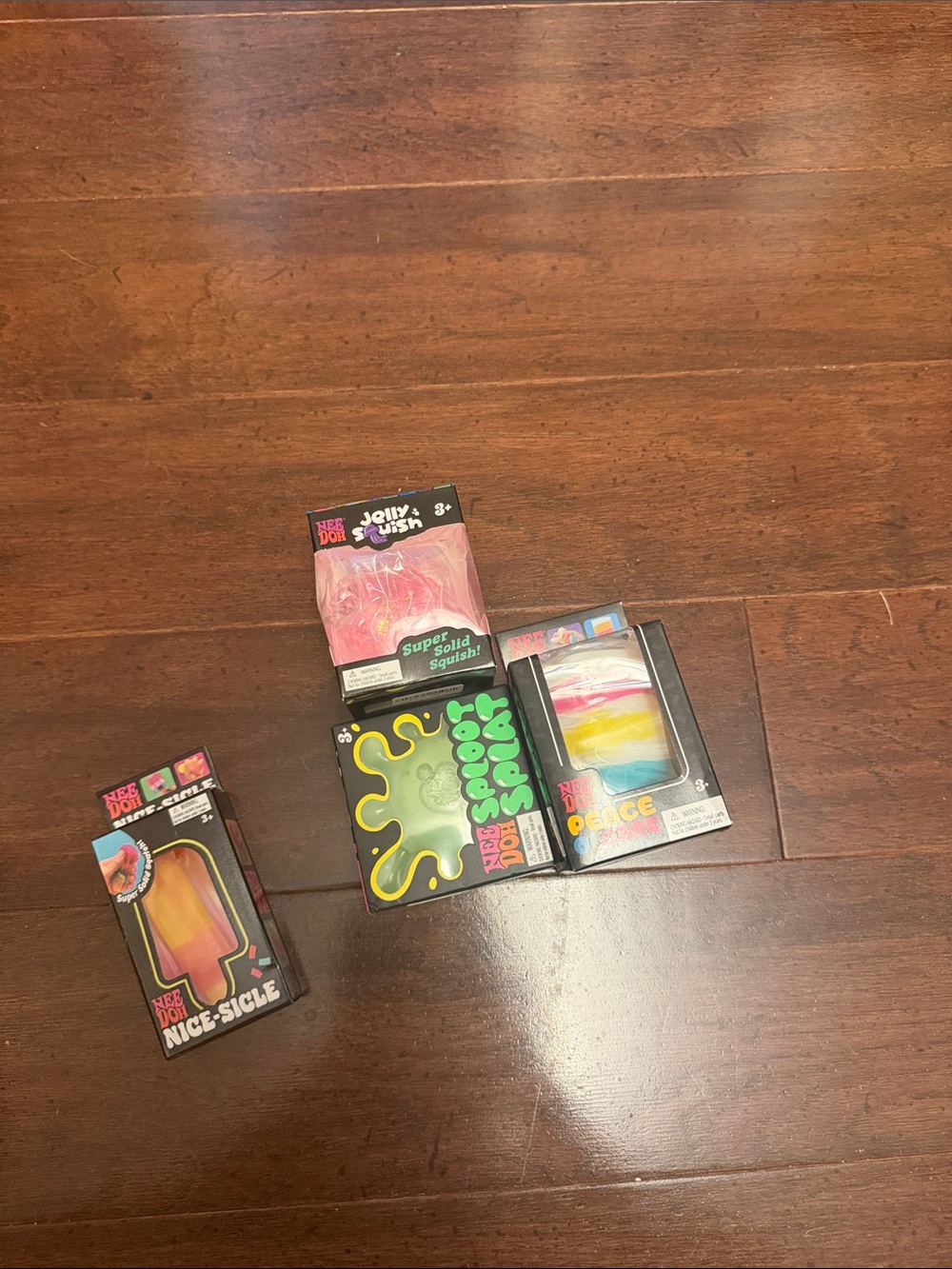 NeeDoh Bundle- peace Cake, nice-sicle, jelly Squish and a sploot splat.